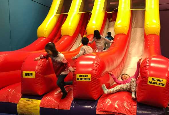 kids-on-inflatable-slide